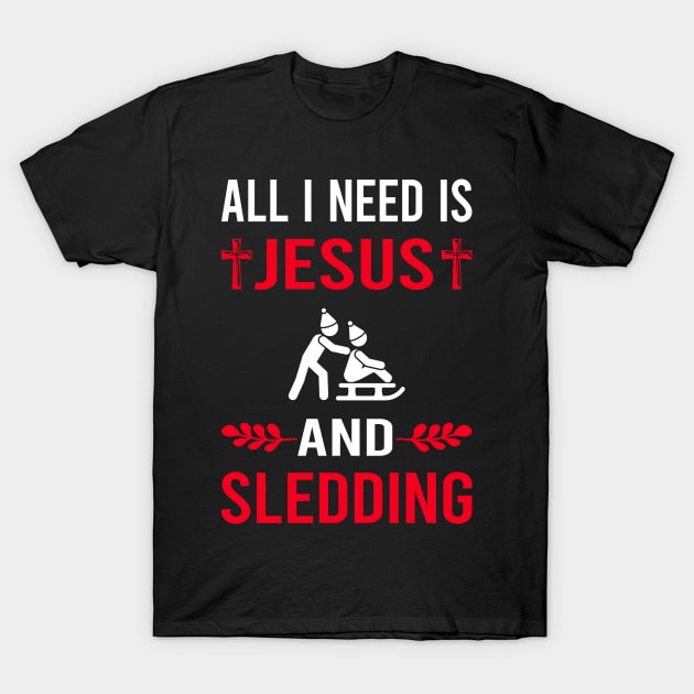 I Need Jesus And Sledding Sledging Sleighing T-Shirt by Bourguignon Aror